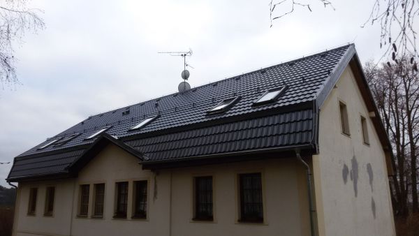 Rekonstrukce střechy bytového domu – fotka 11